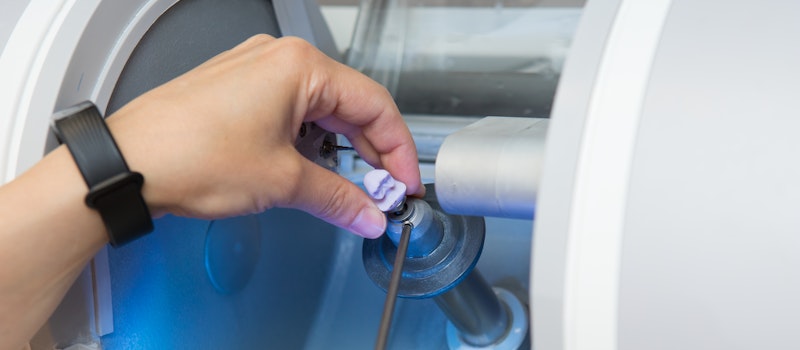 CEREC machine milling a same-day crown